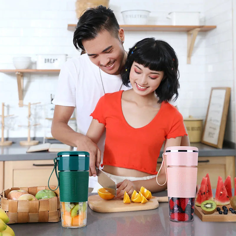 Couple using wireless garlic mincer and vegetable chopper in kitchen