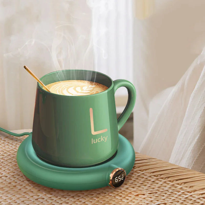 Green coffee mug on USB heating coaster